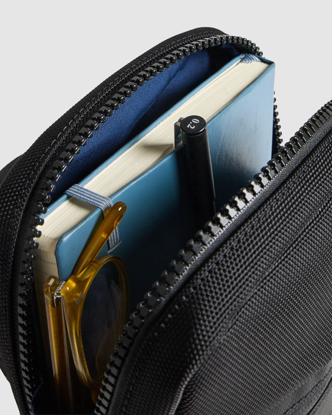 Journey Maker 9 Hour Sling Bag black ballistic nylon interior view