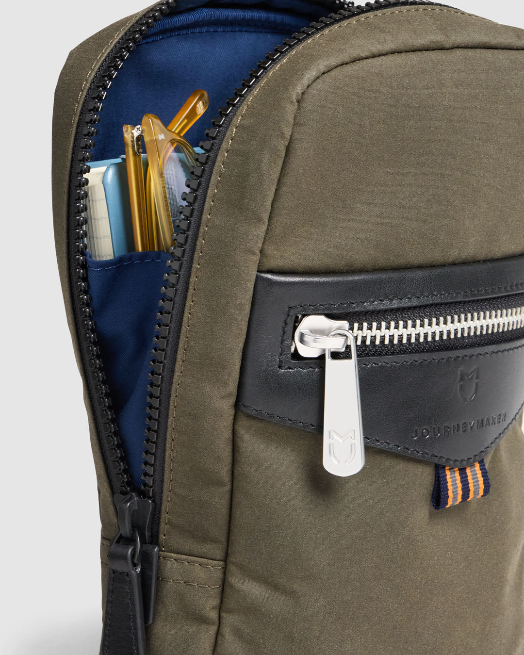 Journey Maker 9 Hour Sling Bag green cotton canvas detail view